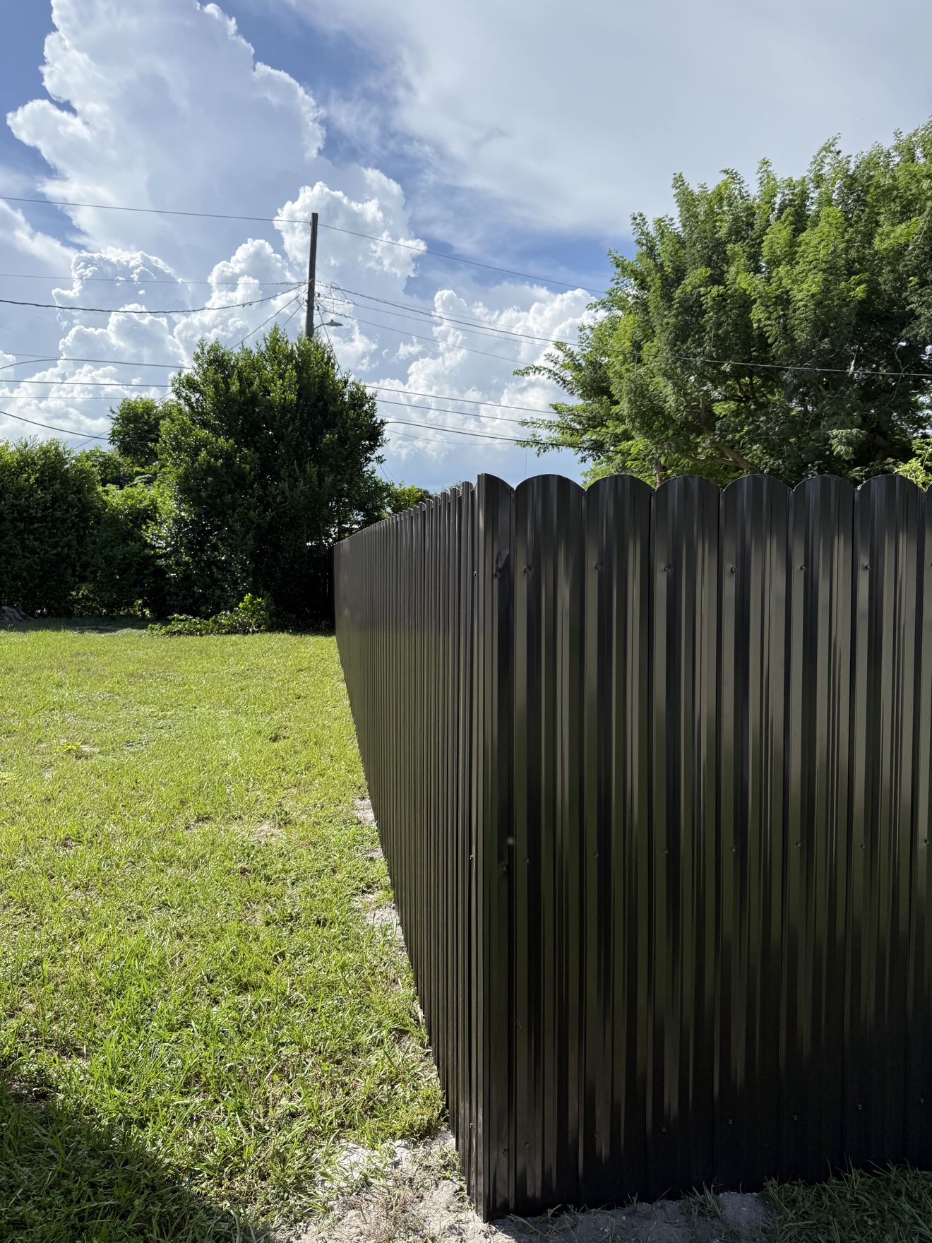 Dark bronze Dura-Fence installed by Fort Fence Masters
